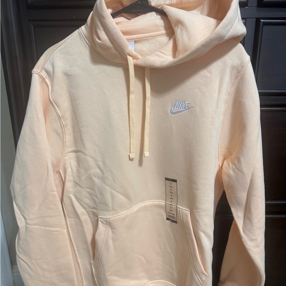 Brand new never worn Nike light orange/peach colored hoodie